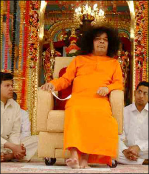 Swami listening to bhajans on Sivarathri night